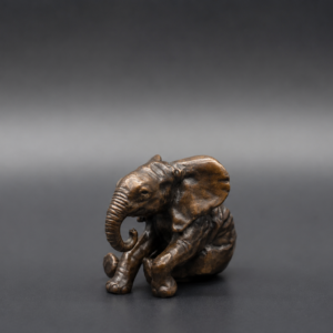 Small Bronze Sitting Elephant Calf