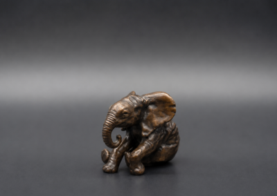 Small Bronze Sitting Elephant Calf